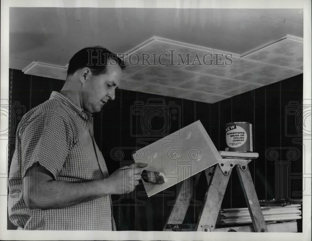 1962 Press Photo Applying Ceiling Tiles with Brush On Cement - nea22882 - Historic Images