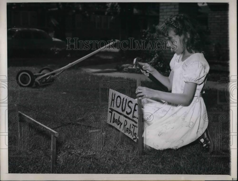 1949 Press Photo Joy Miller Found Bunnies While Mowing Grass - nea23058 - Historic Images