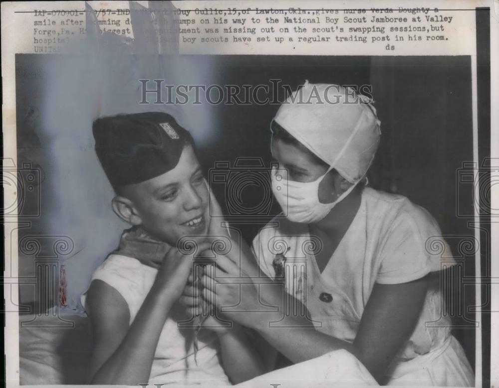 1957 Press Photo Boy Scout Guy Gullie of Lawton, Okla &amp; nurse Verda Doughty - Historic Images