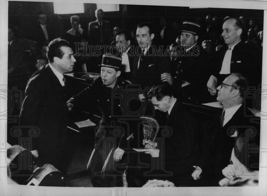 1949 Press Photo Author Vistor Kravchenki Plaintiff in Libel Suit Restrained - Historic Images