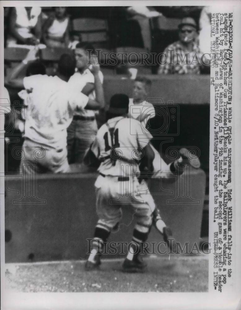 1958 Press Photo Oriole Dick Williams vs Senators Gus Triandos - nea19121 - Historic Images