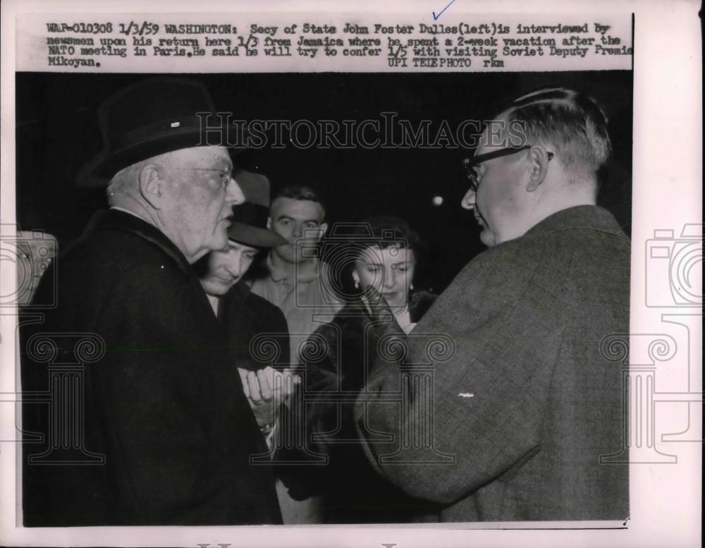 1959 Press Photo US State Sec.John Foster Dulles interviewed by Newsman. - Historic Images