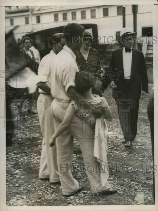1932 Press Photo Victim of Food Poisoning Being Carried - nea33278 - Historic Images