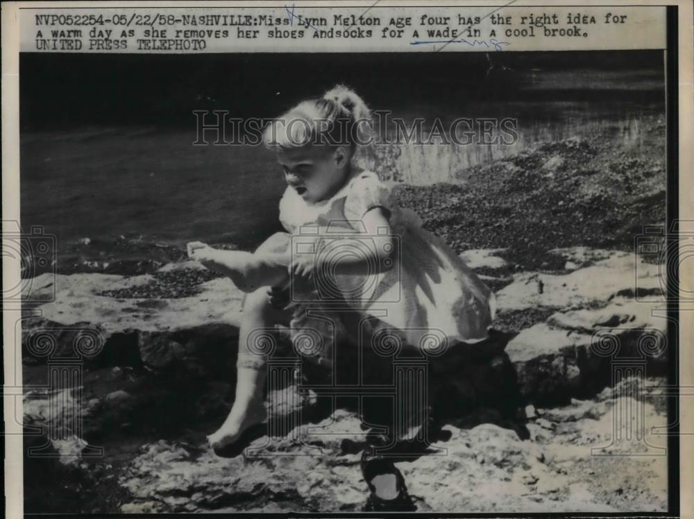 1958 Press Photo Lynn Melton, age 4 wades ina brook - nea33522 - Historic Images