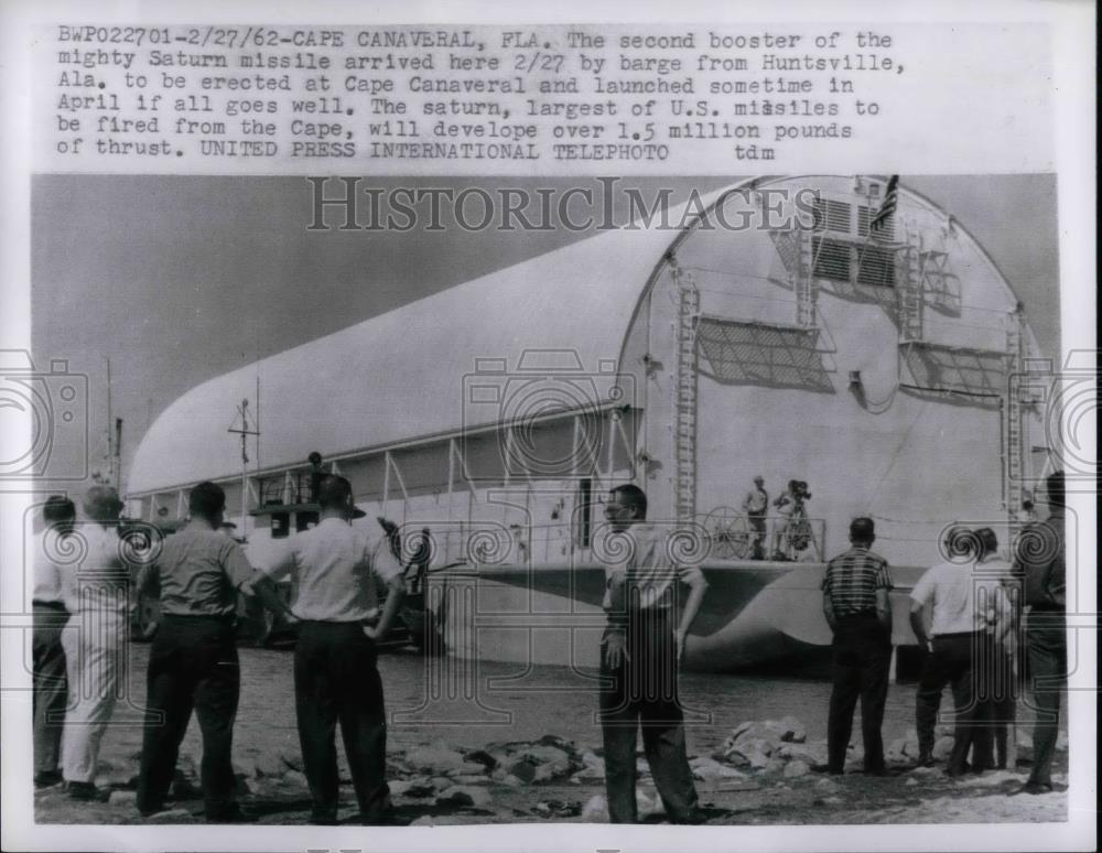 1962 Press Photo Saturn Missile arrived by Barge from Ala. erected at Canaveral. - Historic Images