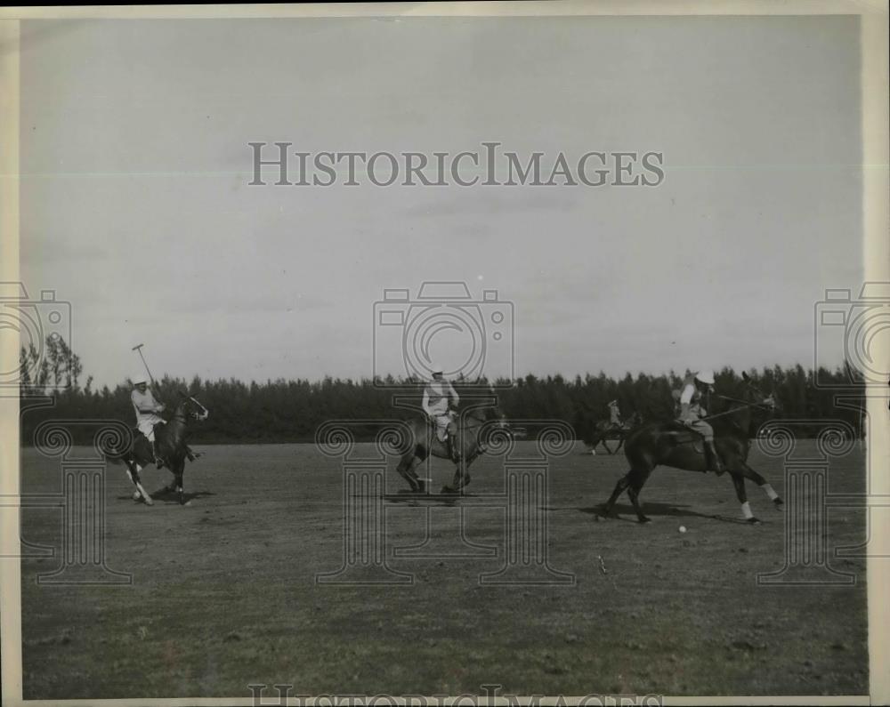 Press Photo Phillip Dune with friends playing Polo. - nea30249 - Historic Images