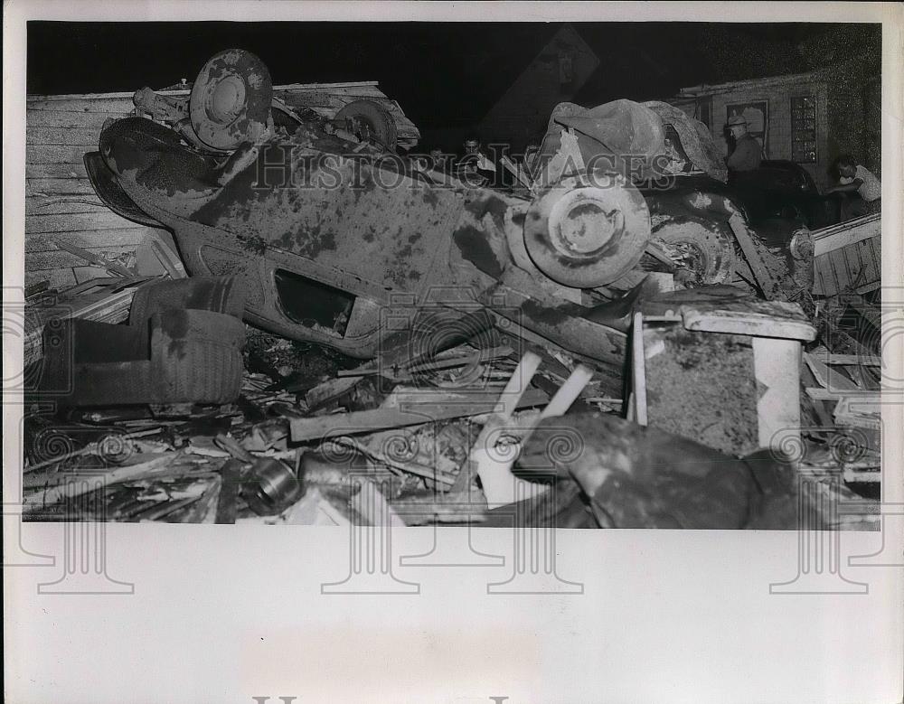 1953 Press Photo Wind Damage Scene of Car and House - nea38384 - Historic Images