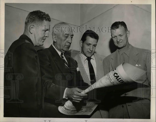1957 Press Photo Paul Adams Ray Watts Clancy Biegler Lars Wagner Read Paper - Historic Images