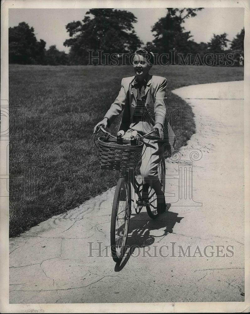 1947 Press Photo Youngster used Bicycle for Picnic and for exercise. - nea36103 - Historic Images