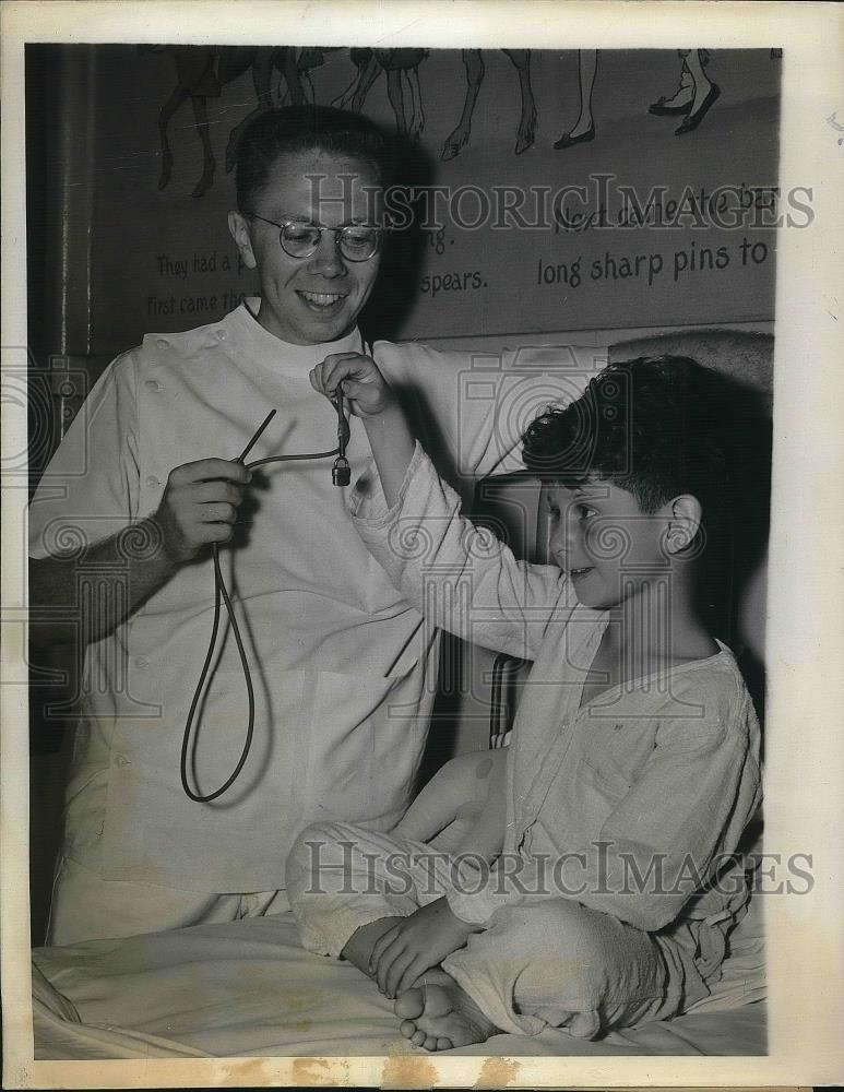 1943 Press Photo Dr. Samuel Achs Aids in Esophagoscopy on Donald Brown, New York - Historic Images