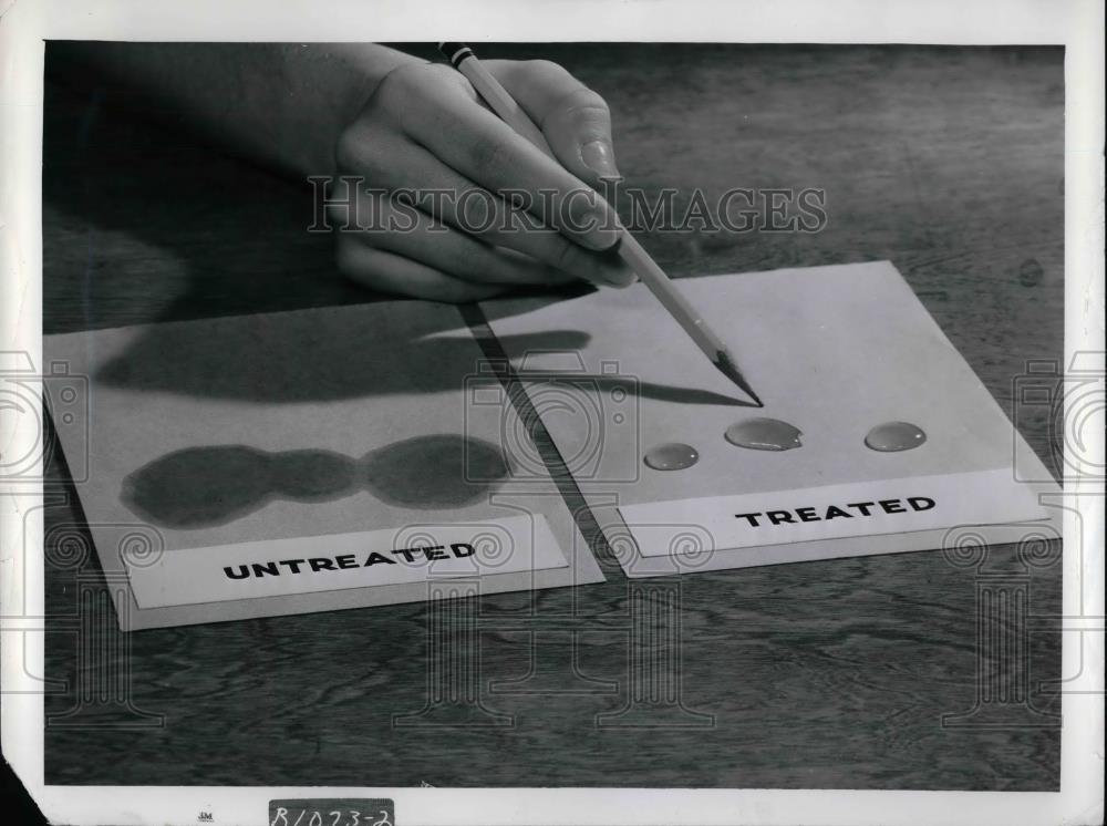 1955 Press Photo Paper That Has Been Treated With Scotchguard - nea37440 - Historic Images