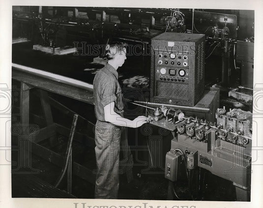 1957 Press Photo machinist working in Chase tube mill - nea57314 - Historic Images