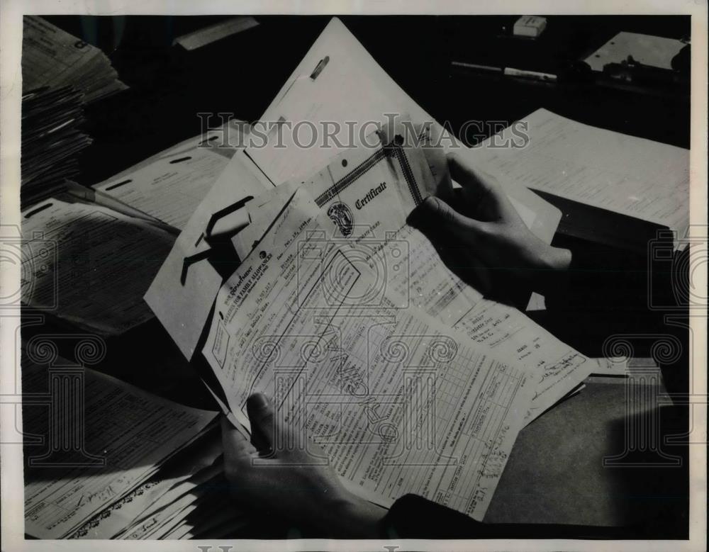1944 Press Photo Family Application Placed in Case Folder - nea58475 - Historic Images