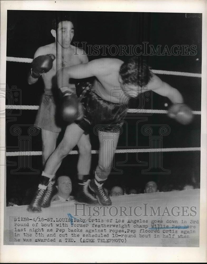 1951 Press Photo Featherweight Champ Willie Pep Knocks Down Baby Ortiz - Historic Images
