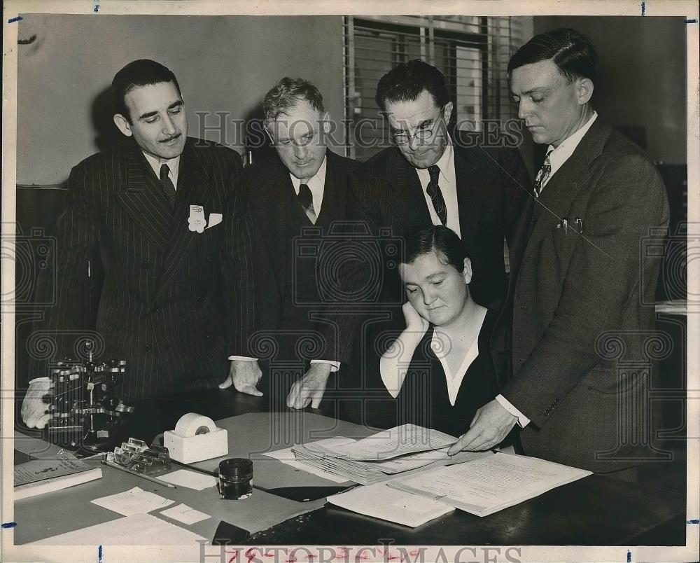 1947 Press Photo Four Businessmen and Lady Worker Looking at Paperwork - Historic Images