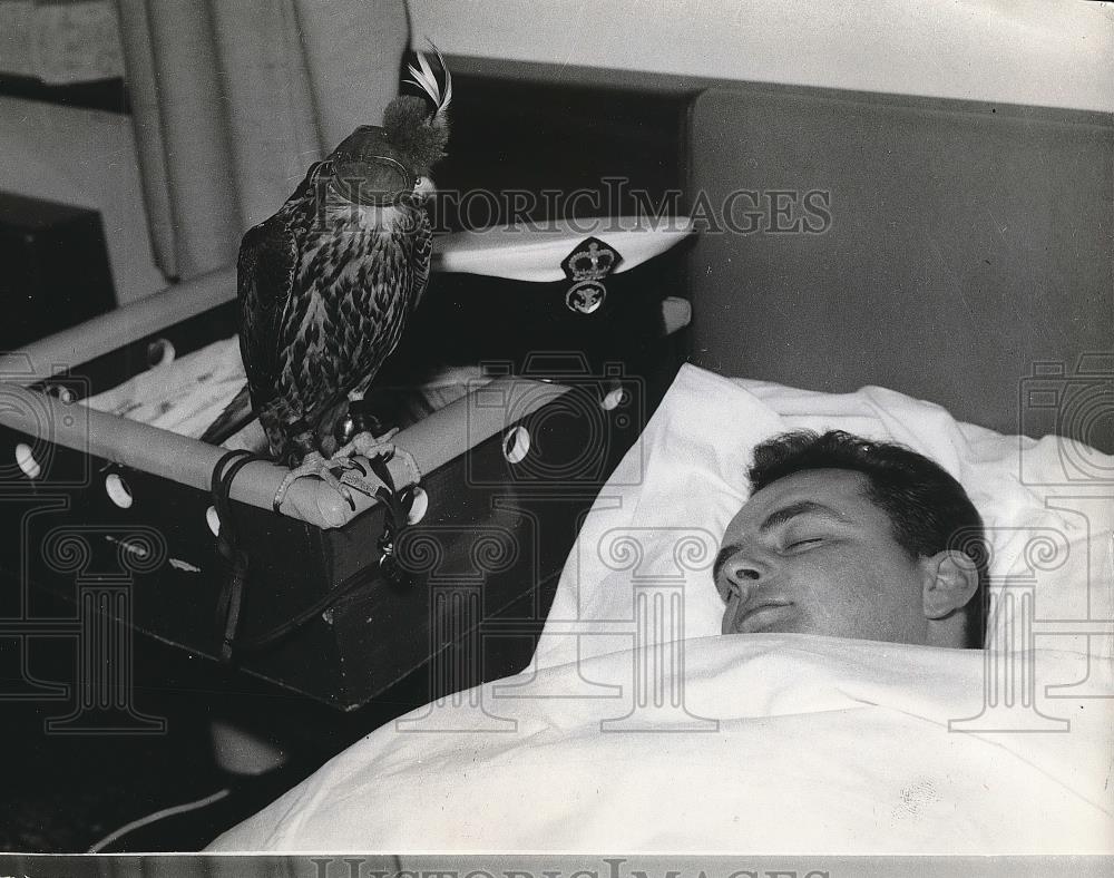 1966 Press Photo Petty Officer Bill Fraser Sleeps as &quot;Cora&quot; Watches - nea68569 - Historic Images