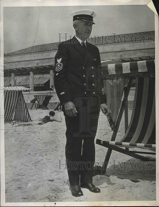 1934 Press Photo Ernest Johnson Turley In Uniform Standing On Beach - nea69104 - Historic Images