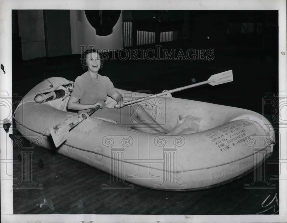 Mary Hayes demonstrating a four person raft used when in 1941 Vintage ...