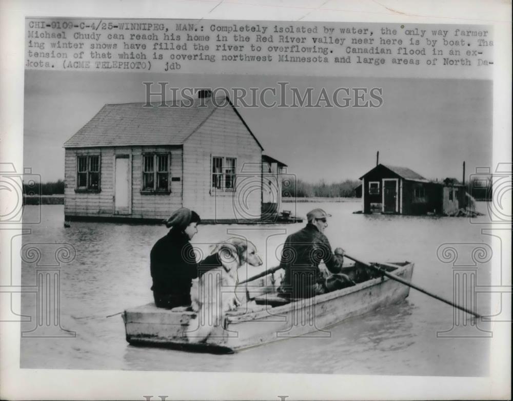 1950 Press Photo Michael Chudy forced to use boat to get home, Red River flood - Historic Images