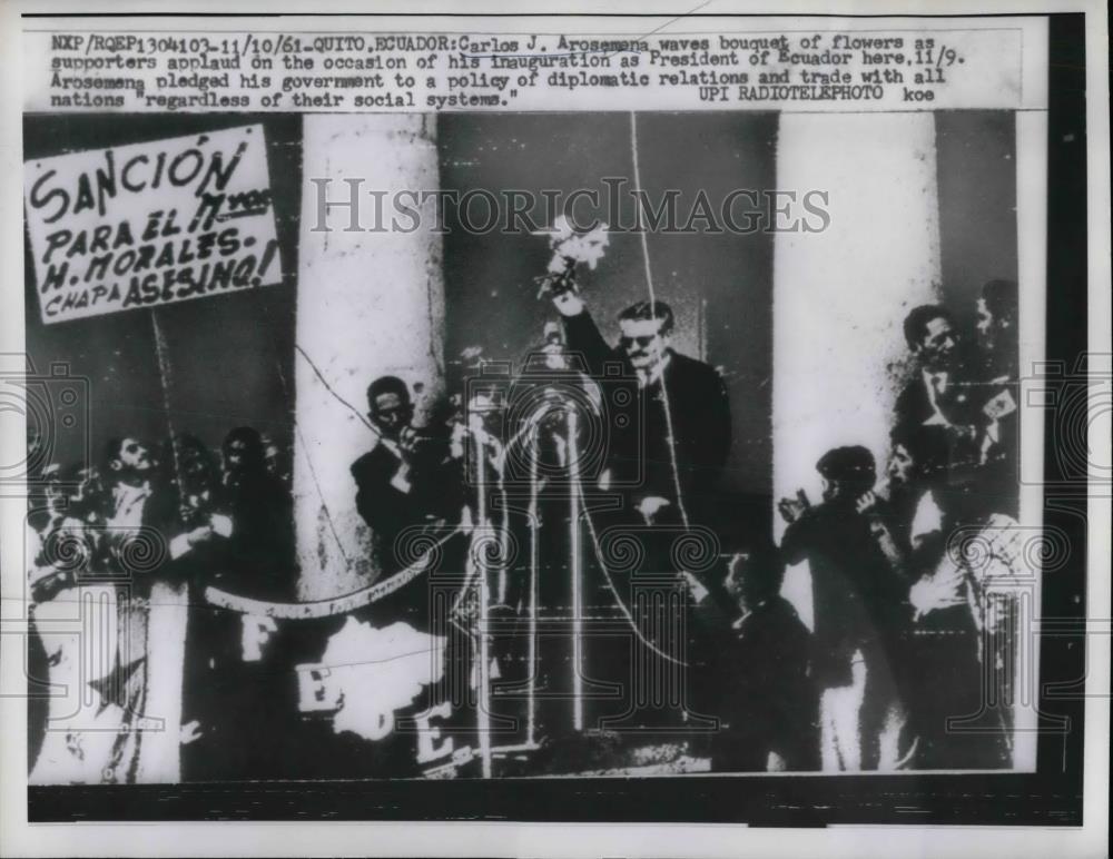1961 Press Photo Carlos J. Arosemena waves flowers during inauguration - Historic Images