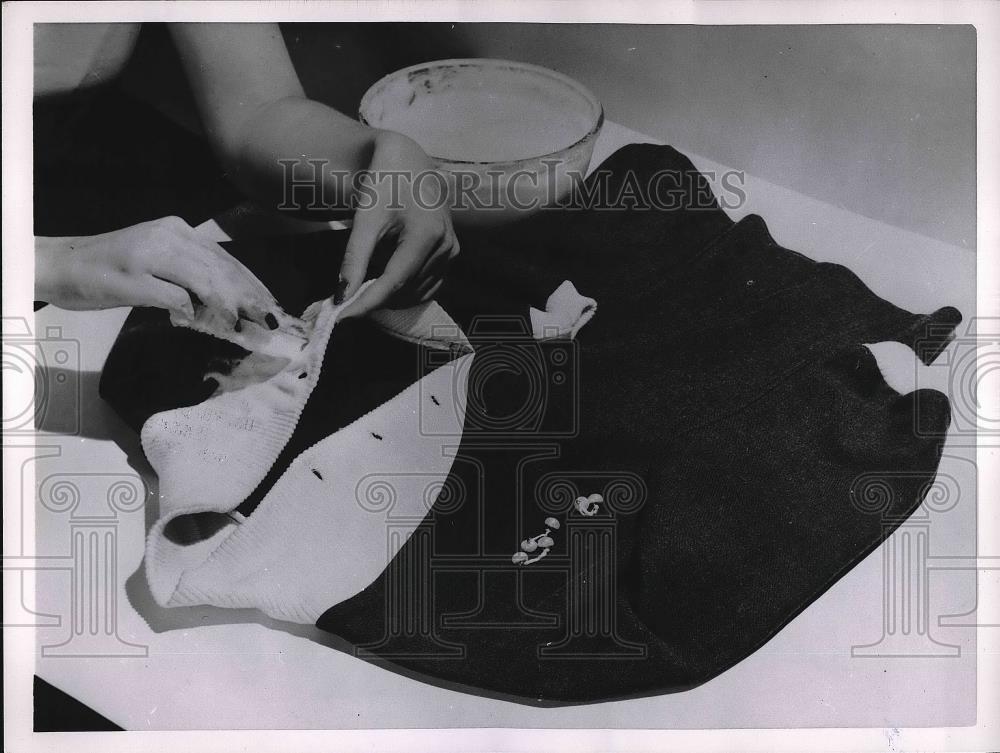 1959 Press Photo Cleaning of Neckline of Shirt - nea83332 - Historic Images