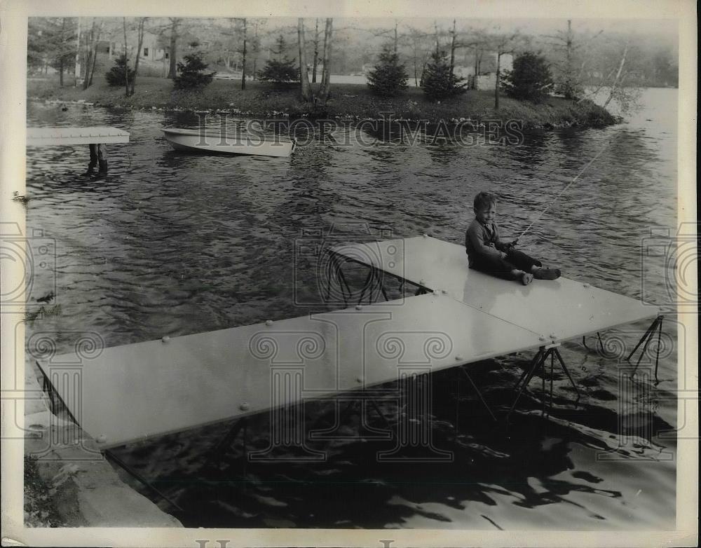 1954 Press Photo Young boy fishing at the Lake. - nea79529 - Historic Images
