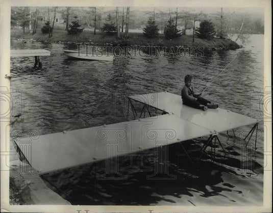 1954 Press Photo Young boy fishing at the Lake. - nea79529 - Historic Images