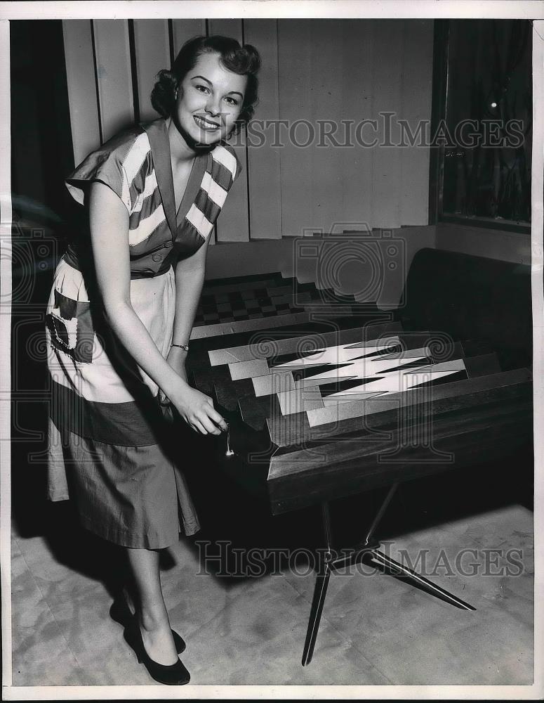 1951 Press Photo Sheila Jackson showing off her new table - nea83125 - Historic Images