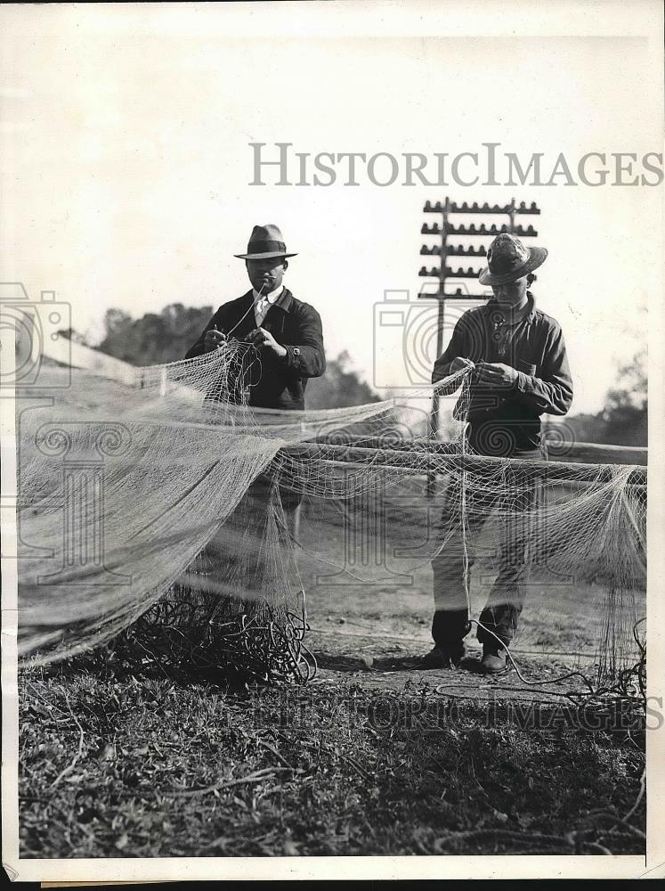 1934 Press Photo Two fishermen &amp; seine nets a=in Georgia - nea78681 - Historic Images