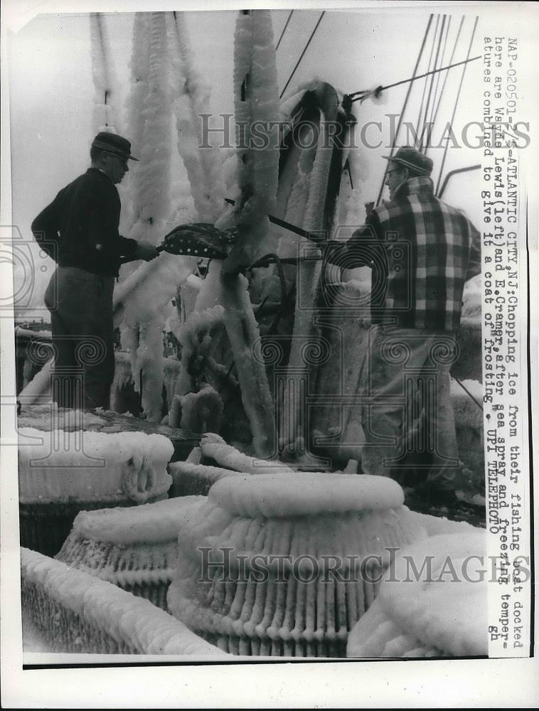 1961 Press Photo Atlantic City, N.J. crew chops ice from their fishing boat - Historic Images