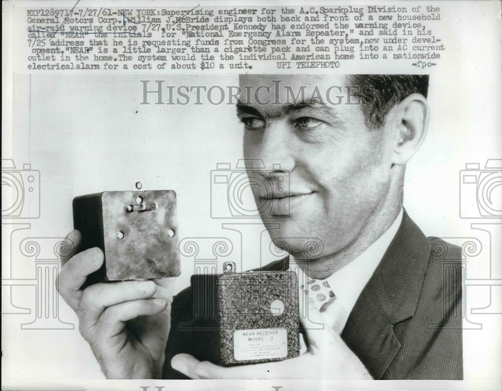 1961 Press Photo AC Sparkplug Div. of GM Corp. William McBride, air raid siren - Historic Images