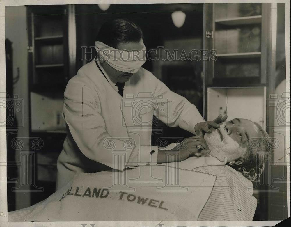 1928 Press Photo Charles Adric being shaved by Leo Weber - Historic Images