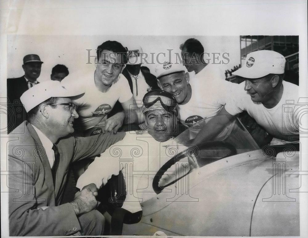 1957 Press Photo Driver Paul Russo Congratulated By Pit Crew - Historic Images