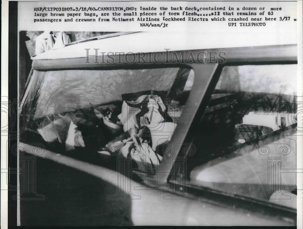 1960 Press Photo Small pieces of torn flesh from wreckage of Northwest Airlines - Historic Images