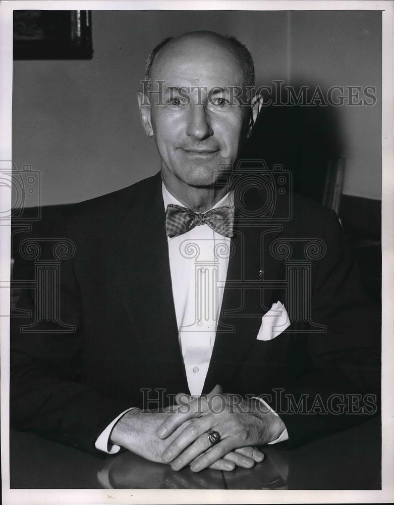 1956 Press Photo Man Sitting At Table With Suit &amp; Bowtie On - neb18602 - Historic Images