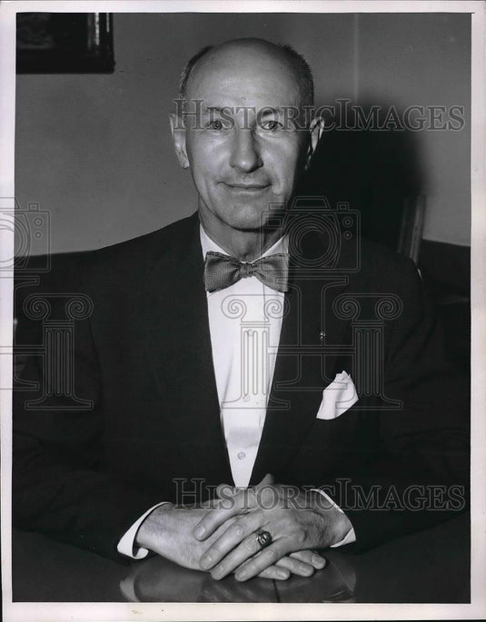 1956 Press Photo Man Sitting At Table With Suit & Bowtie On - neb18602 - Historic Images