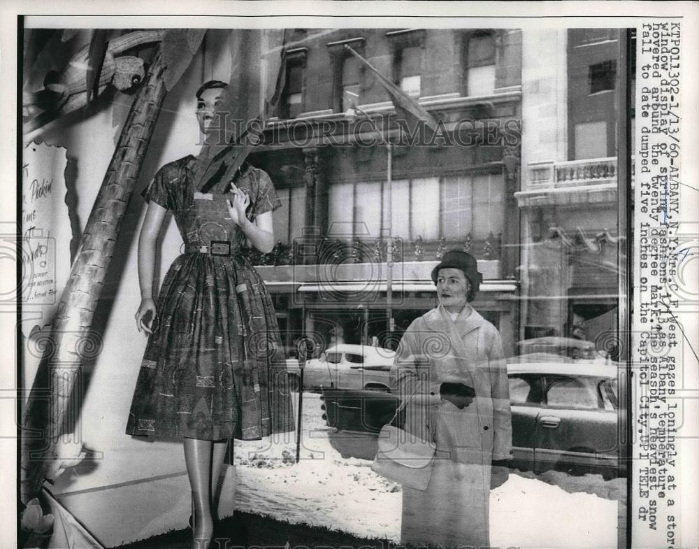 1960 Press Photo Mrs CF West Looks At Storefront Display Of Spring Fashions - Historic Images