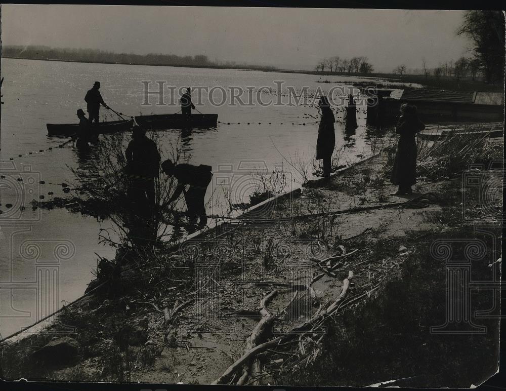 1942 Press Photo Passing the time fishing - nea87249 - Historic Images