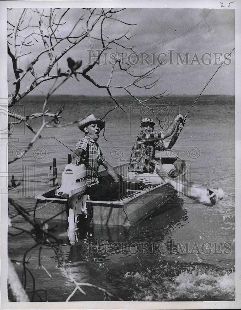 1941 Press Photo Fisherman Fishing In Boat In Lake - nea85088 - Historic Images