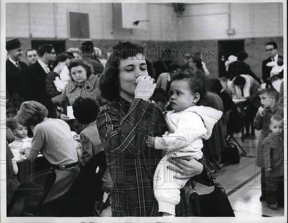 1961 Press Photo Mrs. Catherine Bigelow drinks vaccine &quot;cocktail&quot; - neb20619 - Historic Images