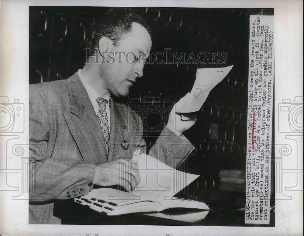 1948 Press Photo Senator Glen Taylor Checks Senate Manual for a Rule - neb21516 - Historic Images