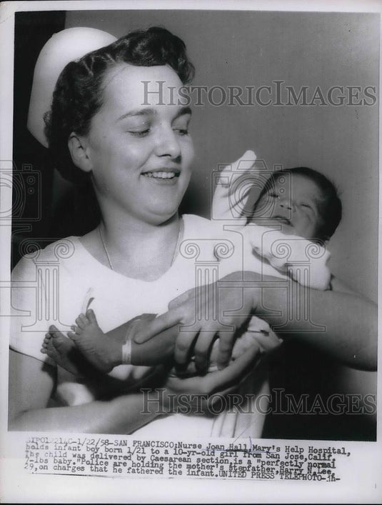 1958 Press Photo Nurse Joan Hall, Mary's Help Hospital, Baby Boy, Harry N. Lee - Historic Images