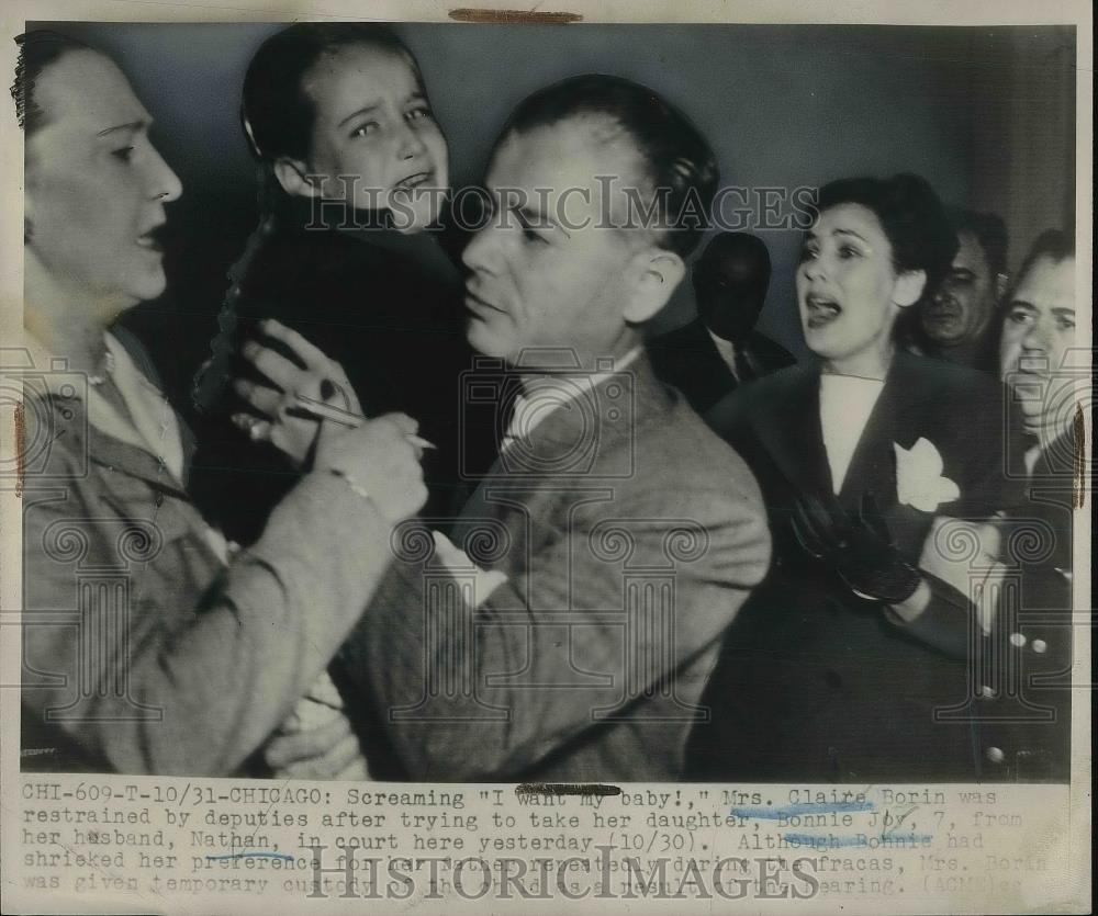 1948 Press Photo Mrs. Claire Borin trying to take her daughter, Bonnie Joy, 7 - Historic Images