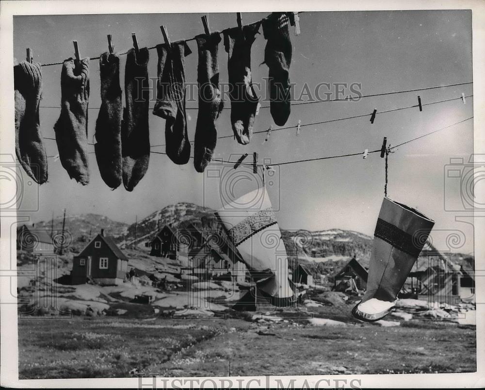 1952 Press Photo Boots and Socks Hanging on Clothesline, Godthaab, Greenland - Historic Images