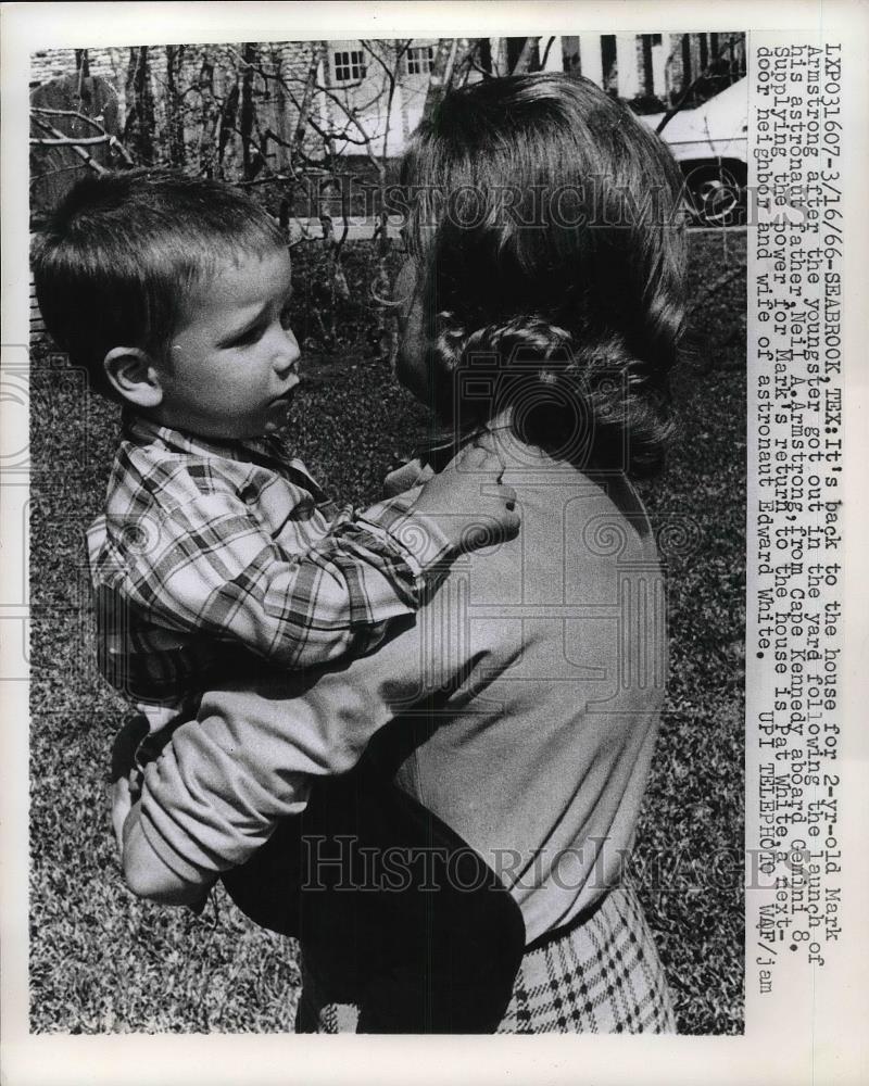 1966 Press Photo Mark Armstrong got out from the yard carried by Pat White - Historic Images