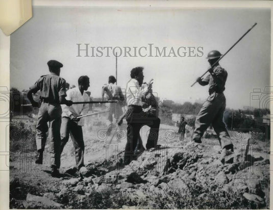 1964 Press Photo Week-old student strike in Karachi, Pakistan, raises his hands - Historic Images
