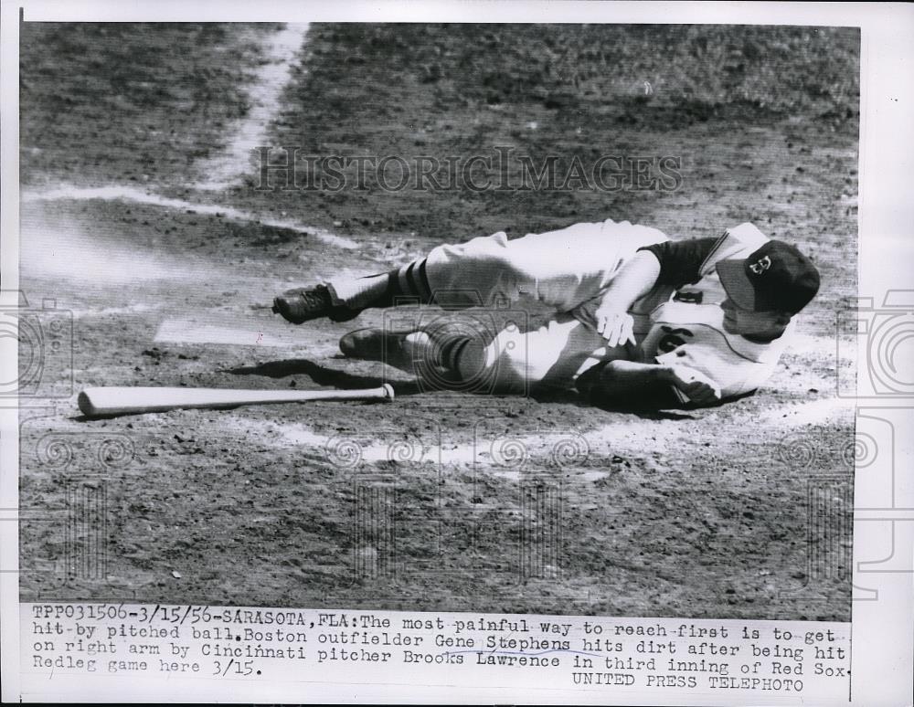 1956 Press Photo Boston outfielder Gene Stephens hits dirt after being hit on - Historic Images