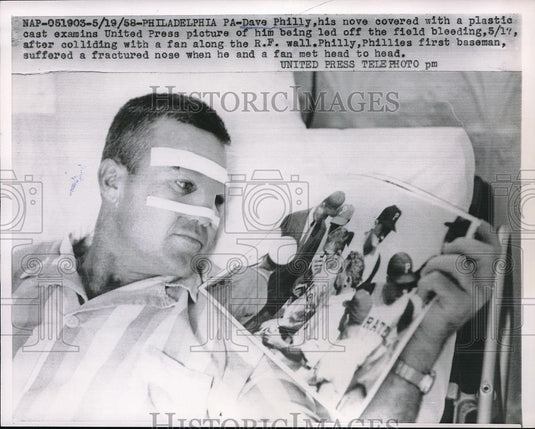 1958 Press Photo Philly player Dave Philly injured by fly ball - Historic Images