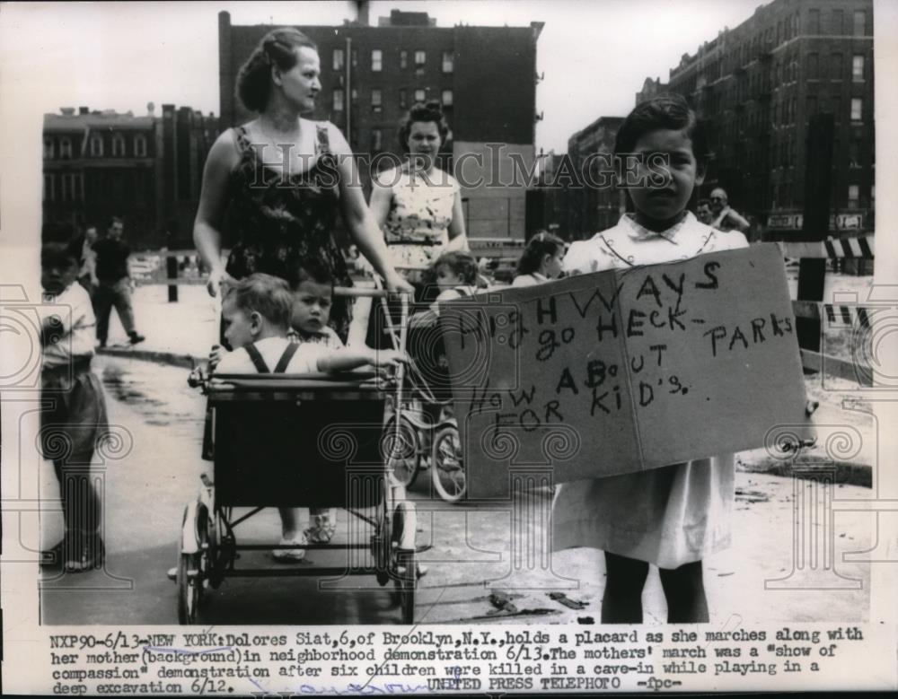 1956 Press Photo Dolores Siat of Brooklyn Holds Sign In Demonstration - Historic Images