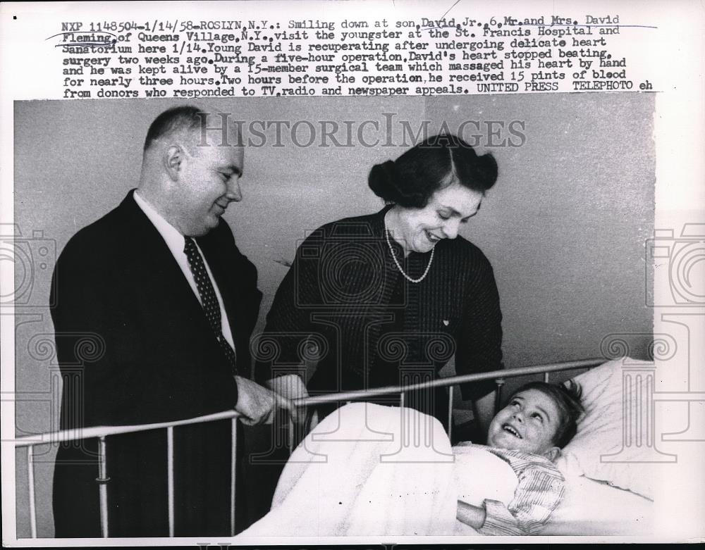 1958 Press Photo Mr. and Mrs. David Fleming with their son David - Historic Images